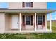 Front porch with two red metal chairs at 6005 S Darlington Rd, Jamestown, IN 46147