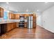 Modern kitchen with stainless steel appliances and wood cabinets at 6005 S Darlington Rd, Jamestown, IN 46147