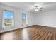 Spacious living room with hardwood floors and ceiling fan at 6005 S Darlington Rd, Jamestown, IN 46147