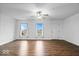 Spacious living room with hardwood floors and ceiling fan at 6005 S Darlington Rd, Jamestown, IN 46147