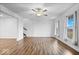 Spacious living room with hardwood floors and ceiling fan at 6005 S Darlington Rd, Jamestown, IN 46147