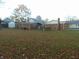 Large backyard with mature trees and open space at 137 E Vine St, Jamestown, IN 46147