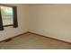 Simple bedroom with carpet, window, and minimal features at 137 E Vine St, Jamestown, IN 46147