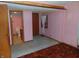 Bedroom with access to bathroom, carpet and pink walls at 137 E Vine St, Jamestown, IN 46147