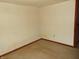 Small bedroom with carpet and neutral-colored walls at 137 E Vine St, Jamestown, IN 46147