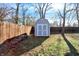 Gray storage shed in backyard at 2121 E 70Th St, Indianapolis, IN 46220