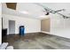 Attached garage with concrete floor and ample space at 295 N Restin Rd, Greenwood, IN 46142