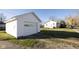 Detached single-car garage with a spacious driveway at 4131 Otterbein Ave, Indianapolis, IN 46227