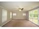 Spacious living room featuring neutral walls and large windows at 4143 N Kitley Ave, Indianapolis, IN 46226