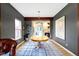 Elegant dining room featuring a large wooden table and statement art at 4351 Chase Cir, Zionsville, IN 46077