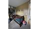 bedroom with crib, dresser, and playful decor at 4515 Rainbow Ct, Indianapolis, IN 46221