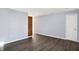 Simple bedroom with gray walls and wood-look floors at 469 Springdale Dr, Whiteland, IN 46184