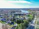 Community overview featuring lake and residential homes at 4770 Winterberry Pl, Columbus, IN 47201