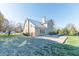 Large backyard with patio and grassy area at 4770 Winterberry Pl, Columbus, IN 47201