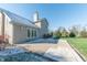 Large backyard with patio and grassy area at 4770 Winterberry Pl, Columbus, IN 47201