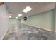 Finished basement with tile flooring and recessed lighting at 4770 Winterberry Pl, Columbus, IN 47201