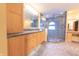 Large bathroom with light wood cabinets, granite counters, and a walk-in shower at 4770 Winterberry Pl, Columbus, IN 47201