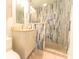 Updated bathroom with granite countertop, new vanity, and a large glass shower at 4770 Winterberry Pl, Columbus, IN 47201