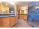 Spacious bathroom with dual vanities, granite countertops, and a large shower at 4770 Winterberry Pl, Columbus, IN 47201