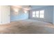 Spacious bedroom with light walls, carpet, and ceiling fan at 4770 Winterberry Pl, Columbus, IN 47201