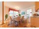 Elegant dining room with hardwood floors, a chandelier, and views to the kitchen at 4770 Winterberry Pl, Columbus, IN 47201