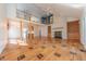 Bright living room with hardwood floors, high ceilings, and a fireplace at 4770 Winterberry Pl, Columbus, IN 47201