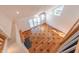 Bright living room with hardwood floors and fireplace at 4770 Winterberry Pl, Columbus, IN 47201