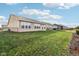 Spacious backyard with a grassy lawn and a black metal fence at 568 Harstad Blvd, Westfield, IN 46074