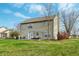 Two-story house with backyard deck and green lawn at 6 Covington St, Brownsburg, IN 46112