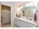 Bathroom with shower and double vanity at 6625 Harvest Moon Ln, Whitestown, IN 46075