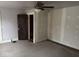 Bedroom with ceiling fan and partial drywall at 915 N Parker Ave, Indianapolis, IN 46201