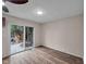 Bright dining area with vinyl flooring and sliding glass doors to backyard at 10539 Folsom Dr, Indianapolis, IN 46235