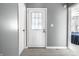 Interior doorway leading into bedroom, with light grey walls and wood floors at 12128 Rossi Dr, Indianapolis, IN 46236