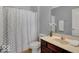 Clean bathroom with shower/tub combo and modern vanity at 14144 Stoney Shore Ave, McCordsville, IN 46055