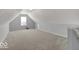 Spacious bonus room with neutral walls and carpet at 14144 Stoney Shore Ave, McCordsville, IN 46055