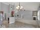 Dining area with tile flooring and chandelier at 14144 Stoney Shore Ave, McCordsville, IN 46055