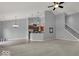 Open kitchen with island, stainless steel appliances, and dining area at 14144 Stoney Shore Ave, McCordsville, IN 46055