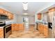 Modern kitchen featuring stainless steel appliances and wood cabinets at 15230 Fawn Meadow Dr, Noblesville, IN 46060