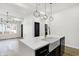 Modern kitchen with white quartz island and farmhouse sink at 2202 Bellefontaine St, Indianapolis, IN 46205