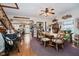 Farmhouse-style dining room with wooden table, chairs, and hardwood floors at 2412 W State Road 128, Alexandria, IN 46001