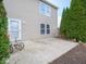 House back view with a small patio and green trees at 2832 Earlswood Ln, Indianapolis, IN 46217