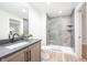 Modern basement bathroom with a hexagon-tiled shower at 3809 Cherwell Drive, Zionsville, IN 46077