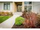 Welcoming entryway with a modern door and attractive landscaping at 3809 Cherwell Drive, Zionsville, IN 46077