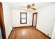 Simple bedroom with hardwood floors and closet at 5064 Ford St, Indianapolis, IN 46224