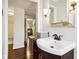 Bathroom with vanity, mirror, and view of bedroom at 507 E 5Th St, Sheridan, IN 46069