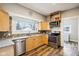 Bright kitchen featuring stainless steel appliances and wood cabinets at 507 E 5Th St, Sheridan, IN 46069