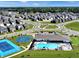 Aerial view of community with pool, tennis court, and basketball court at 6196 Granby Dr, Whitestown, IN 46075