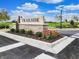 Trailside community entrance with landscaping and signage at 6196 Granby Dr, Whitestown, IN 46075