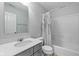 Clean bathroom with shower/tub combo, vanity, and mirror at 9044 Ramapo Dr, Fishers, IN 46038