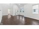 Spacious living room with hardwood floors and vaulted ceiling at 1037 Jefferson Ave, Indianapolis, IN 46201